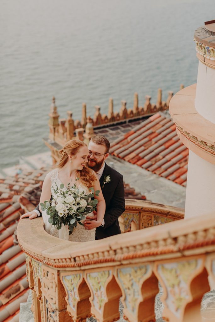 bride and groom in the ringling belvedere tower