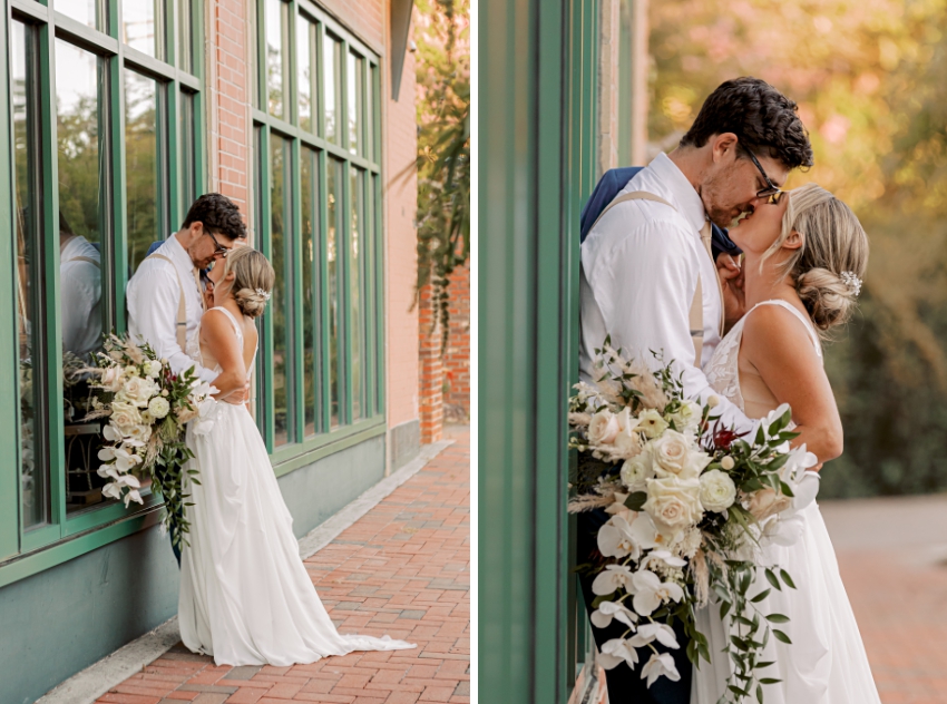 bride and groom kissing against a building by sharon elizabeth co