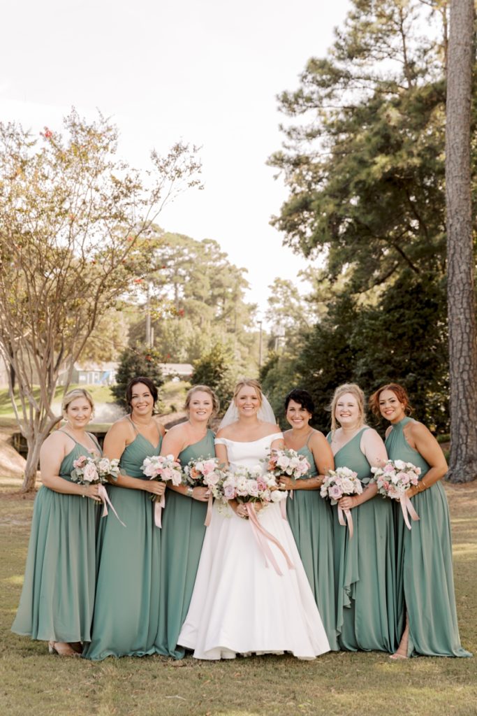 bride with bridesmaids at duck woods country club by sharon elizabeth co