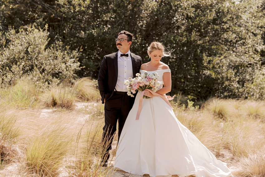 bride and groom portraits in beach grass by sharon elizabeth co