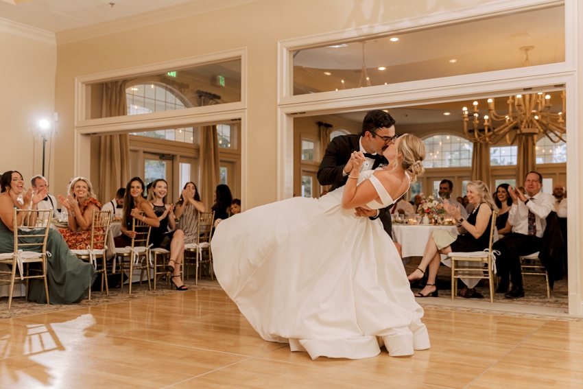 bride and groom first dance dip at duck woods country club by sharon elizabeth co