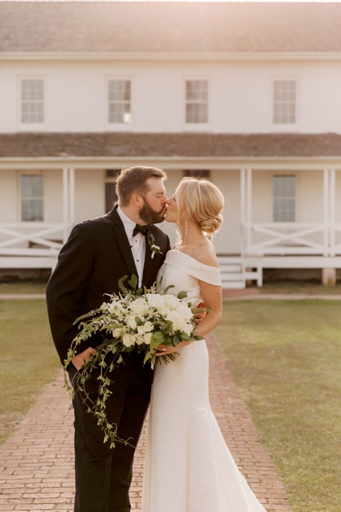 bride and groom at bodie island lighthouse