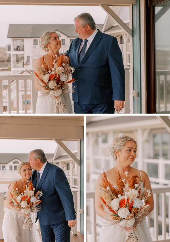 bride and dad hug during first look on porch of beach house in Kill Devil Hills