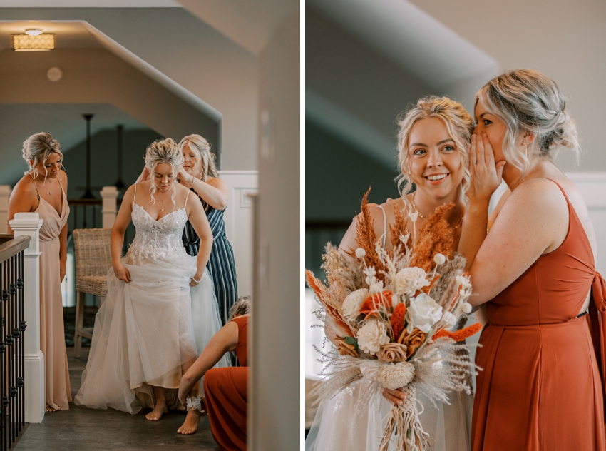 bridesmaid whispers in bride's ear during prep for beach wedding at beach house in Kill Devil Hills