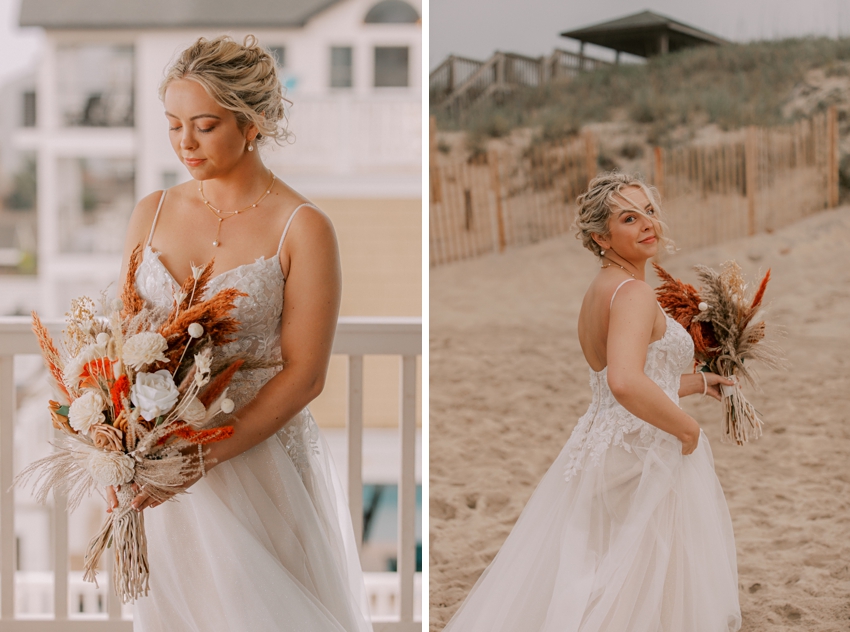 bride holds bouquet of white, orange, and red florals on beach 