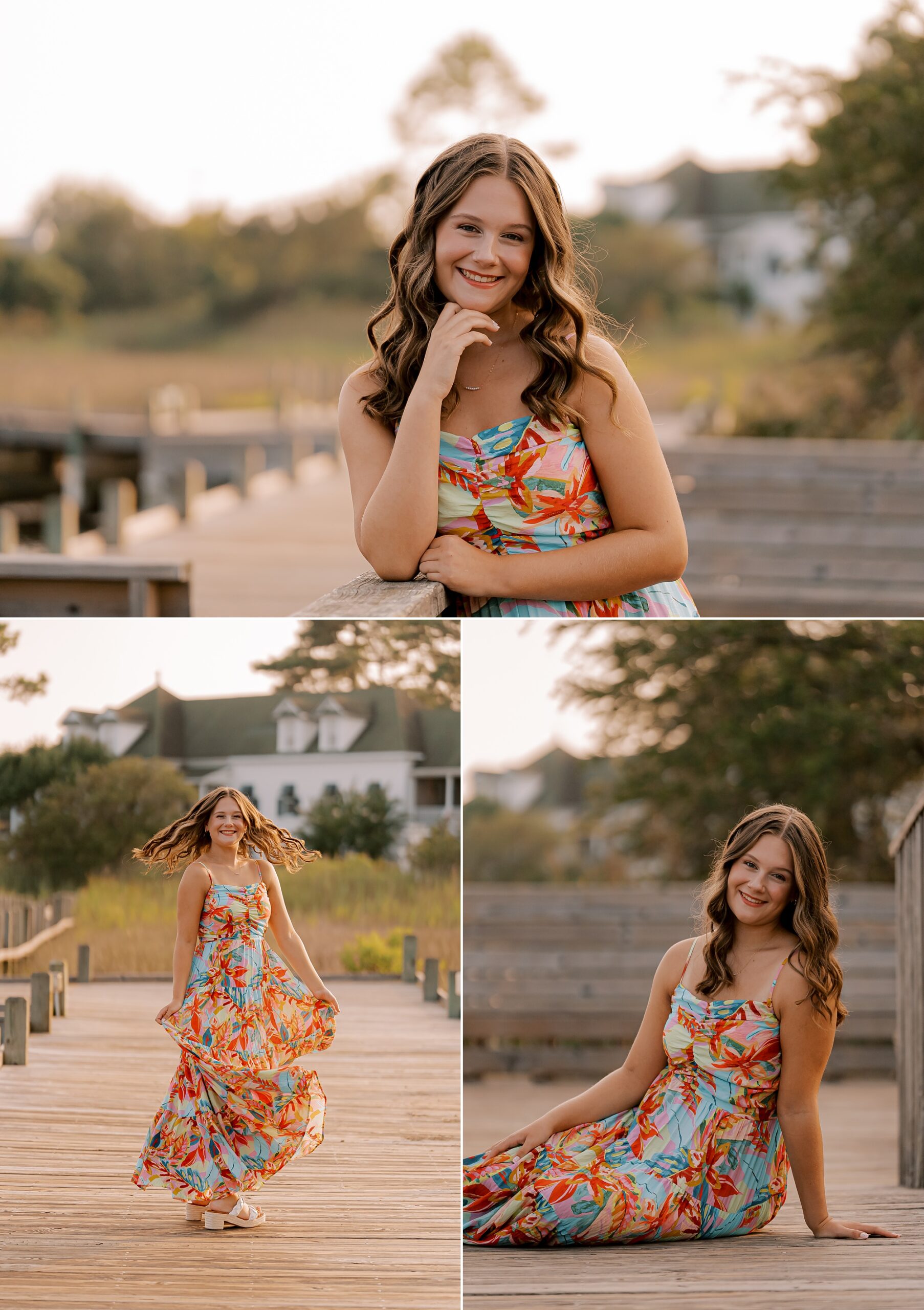 girl sits on wooden dock in floral dress during outer banks senior portraits